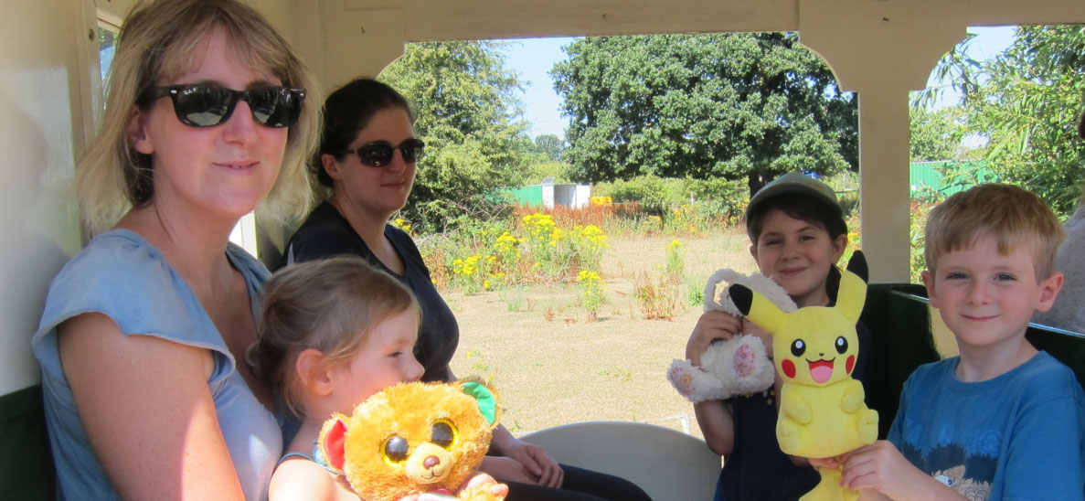 Family On Coach With Bears Copy 2 1 1187×548 C Optimised